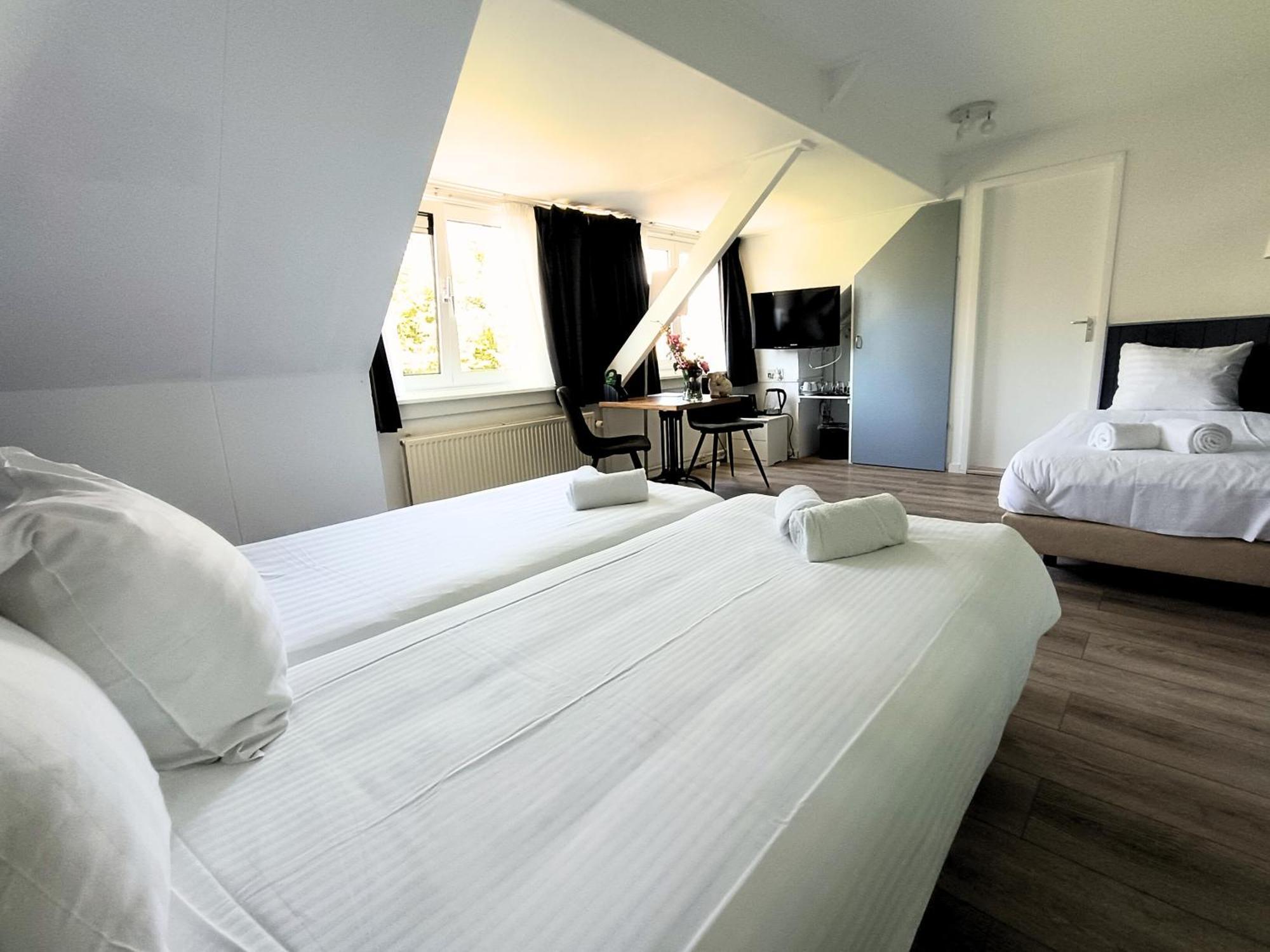 Hotel Den Burg Esterno foto